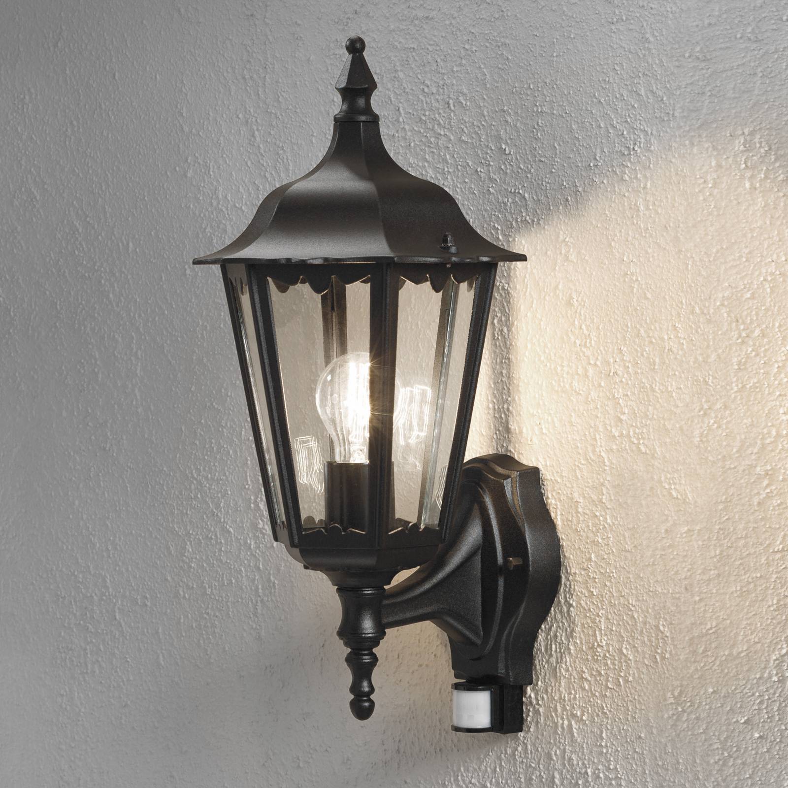 Konstsmide Buitenwandlamp Firenze, sensor, staand, zwart